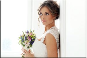 Wedding. Attractive bride with bouquet